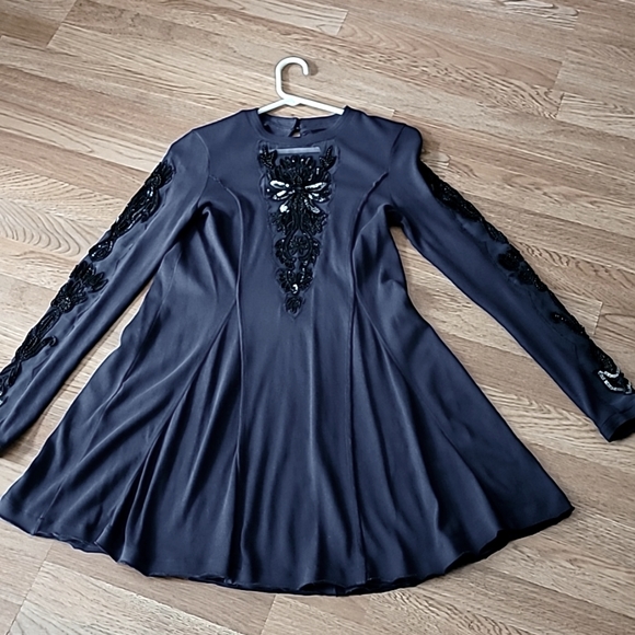 NEW ROMANTICS by Free People Dresses & Skirts - NEW ROMANTICS  Navy dress with embellished sleeves and front of dress. SIZE XS